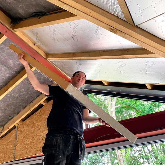 Work being carried on a roof on a new home build